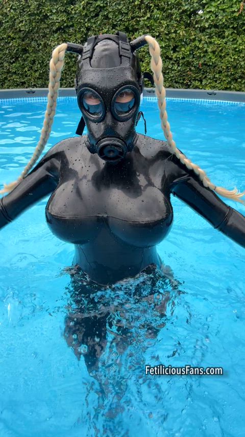 big tits boobs catsuit fetish kinky latex latex gloves pool rubber swimming pool