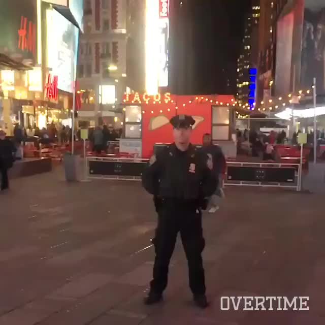 BLACk guy juMPS A wHitE COp