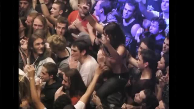 Random guys grope the tits of a girl flashing in the audience of a concert