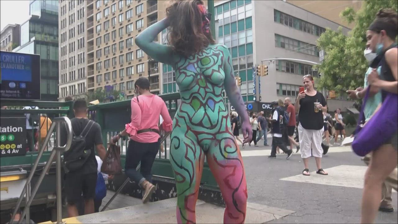 Girl walks around in nothing but body paint in crowded NYC