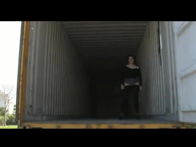Girl in Empty Container Lorry