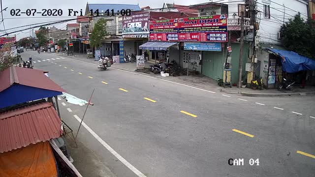 Motorcycle tries to pass truck