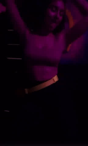 Young girl with big, perky tits dancing