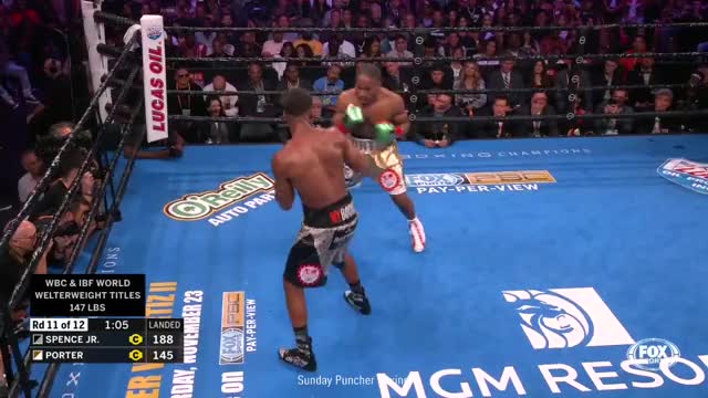 Errol Spence Jr. knocks down Shawn Porter in the 11th to solidify his win, and then
