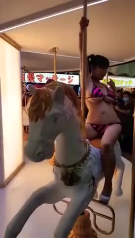 Looking sexy on the merry-go-round