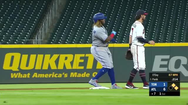 Vladimir Guerrero Jr. assaults Dansby Swanson.