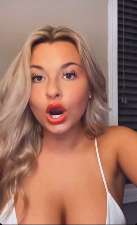 blonde cleavage nipslip gif