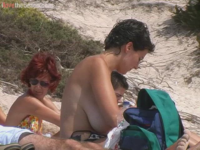 amateur beach big tits boobs milf natural tits nudist public spy tits gif