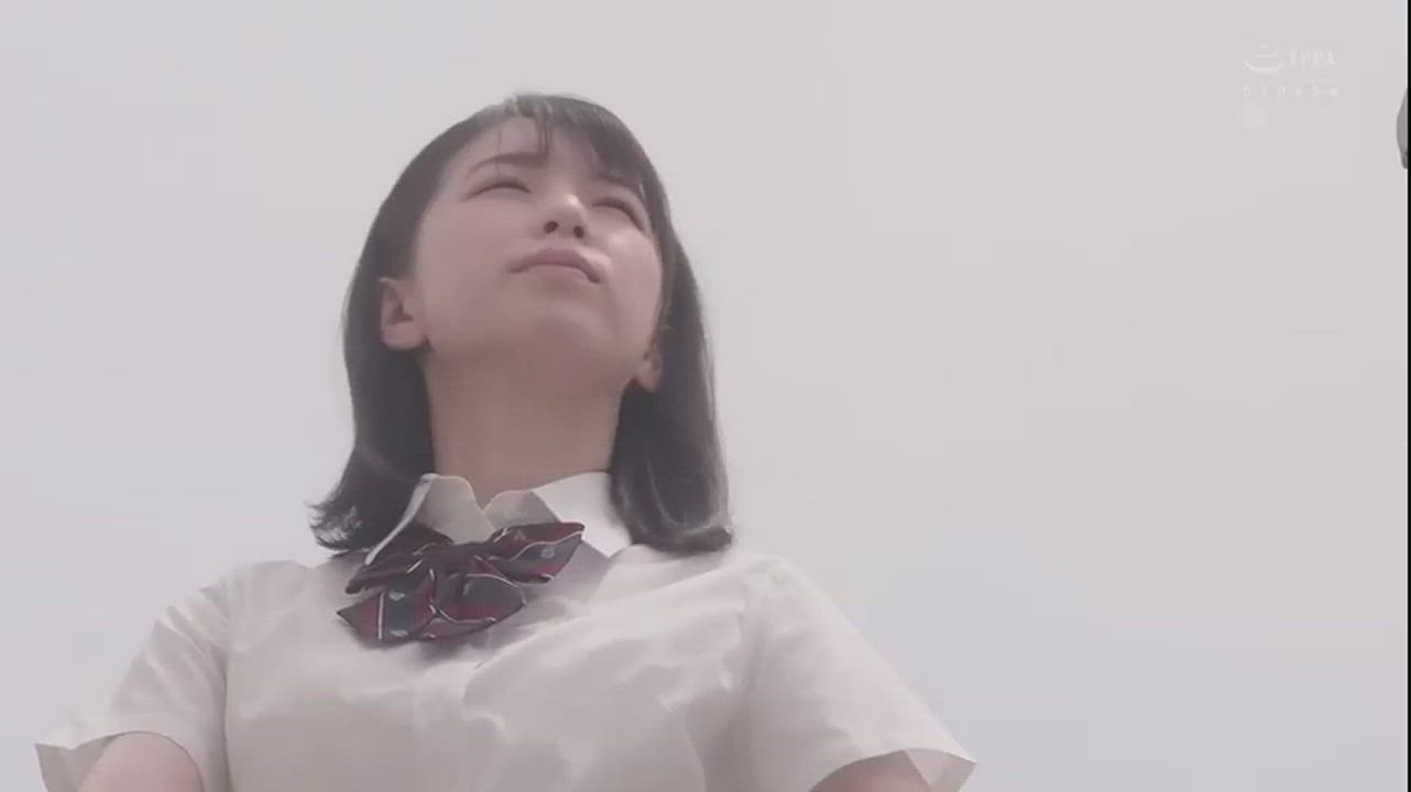 Japanese schoolgirl enjoying the breeze