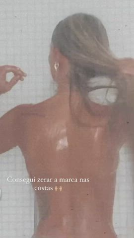 blonde brazilian celebrity shower sideboob gif