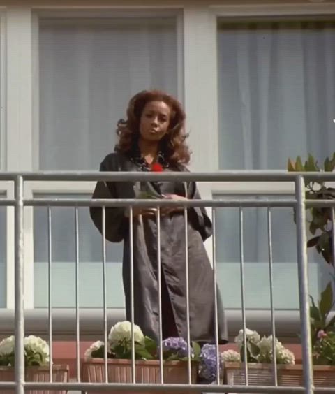actress balcony celebrity cleavage ebony lingerie movie outdoor robe teasing gif