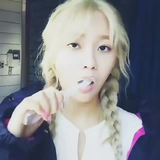 Yuna brushing her teeth