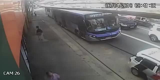 Old woman hit by a bus while crossing street