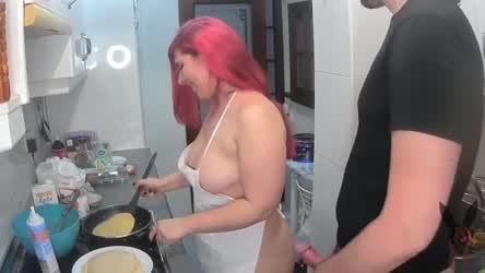 Fucking her while she makes him breakfast