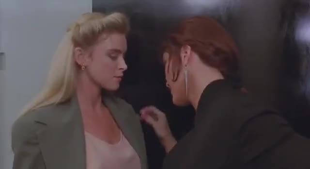 Corinna Everson frisks Alonna Shaw Double Impact 1991