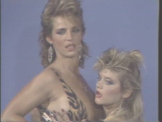 Erica Boyer and Ginger Lynn posing for Marc Wallice in "Modeling Studio"