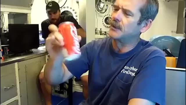 Opening a can of soda in a submarine