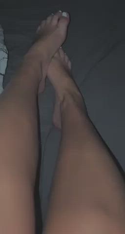 Girlfriend rubbing her feet