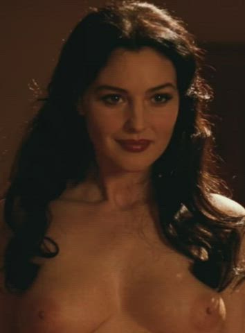 Malena featured Monica Bellucci, in her MILF goddess prime, stripping off in front