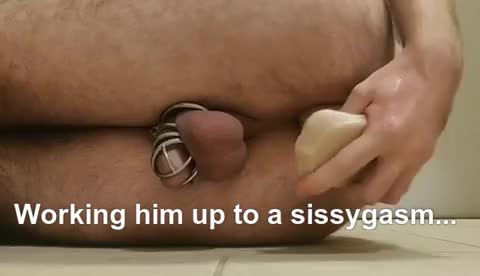 Working him up to a sissygasm...