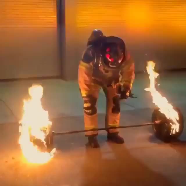 50 year old firefighter deadlifts 600 lbs of flaming steel to celebrate his retirement