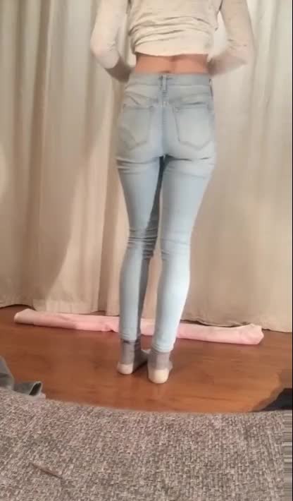 Completely soaking her jeans