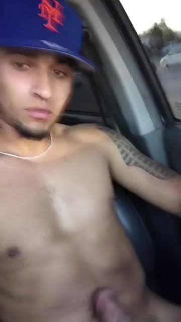 Spitting on his cock in the carpark