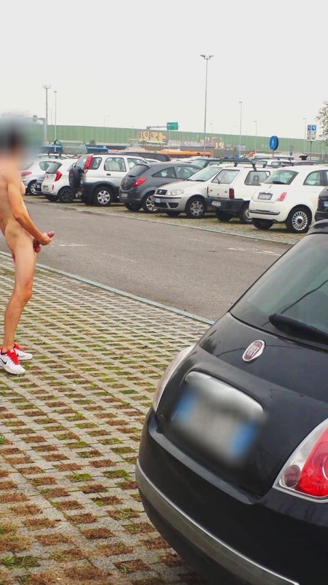 Total naked hard cock masturbation in a public parking lot