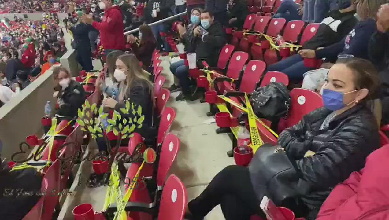 Flashing Mexican girl in a stadium.