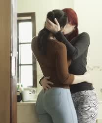 Hot Brunette And Redhead Kissing