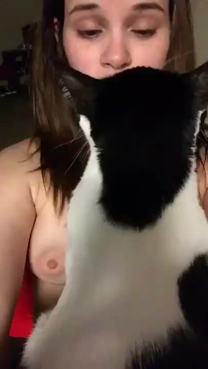 Kitty massaging Titties