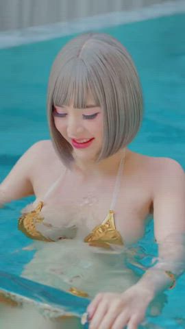 Asian Bikini Bouncing Underwater gif