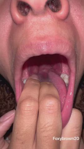 close up ebony spit throat tongue fetish gif