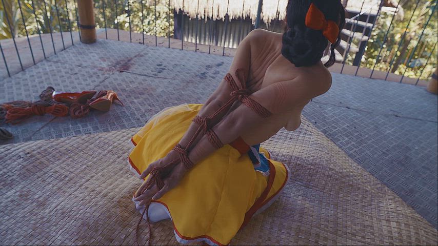 Pervert Snow White sucks big dildo with tied hands in strappado