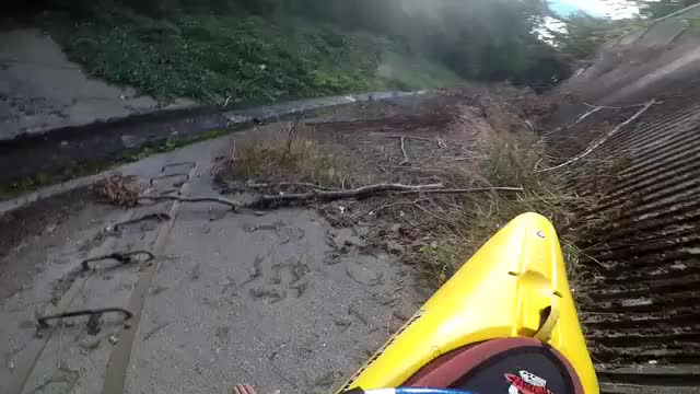 Kayaking down a ditch at insane speed