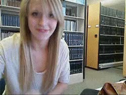 girl in library revealing she has dildo in her pussy