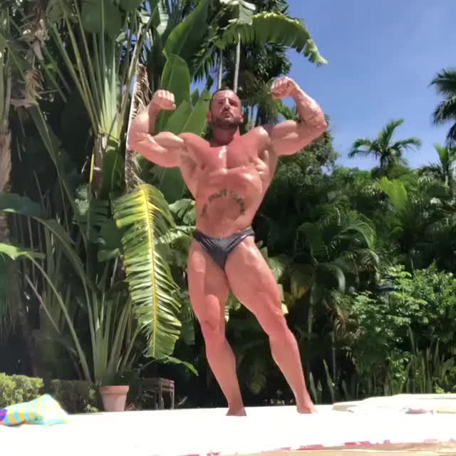 Showing off his godly physique at the beach