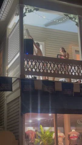 Getting flogged on a balcony at Fantasyfest