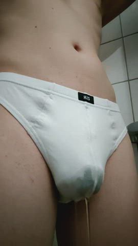 Me pissing in my thong and taking it into my mouth.