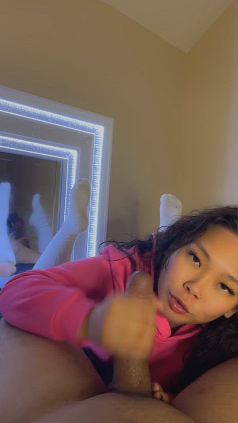 I love the way his big cock feels in my small Asian hands