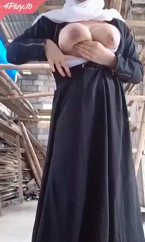 Busty hijab exhibitionist.