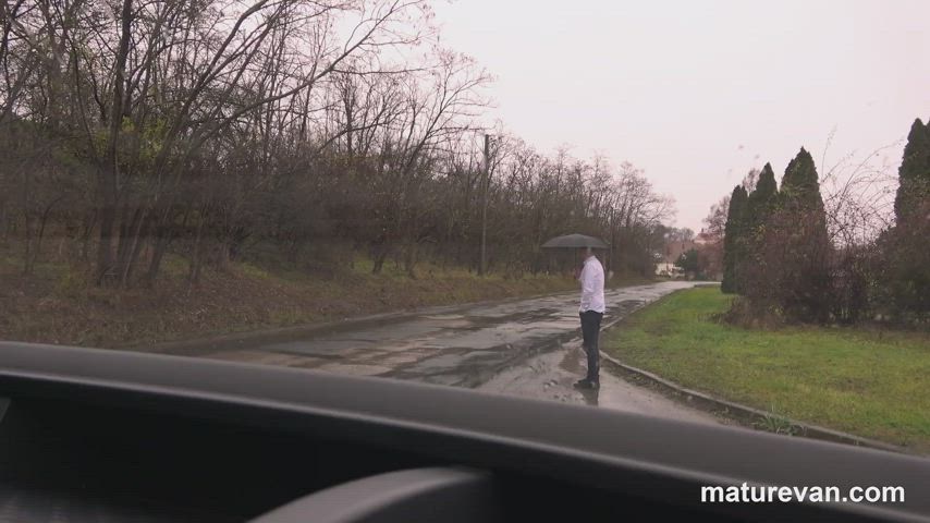 Mature mom with a young couple inside a van