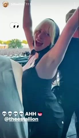 Billie Eilish bouncing tits at a concert