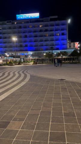 With my boobs out on the beach at night!