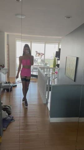 clothed high heels latex nylons pink selfie skirt trans zariah aura gif
