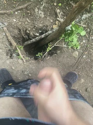 My virgin cock cumming outside in a hole