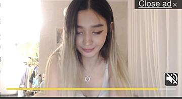 name of this asian webcam girl in yellow sundress?