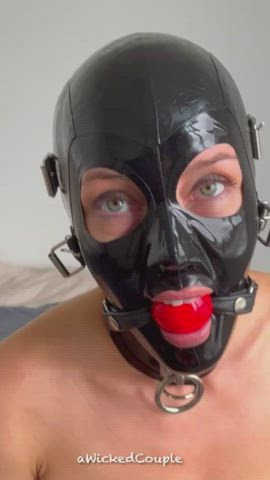 bdsm drooling gagged latex slave gif