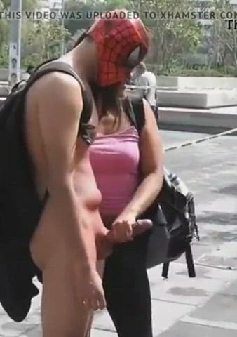 She Gives Him A Public Handjob