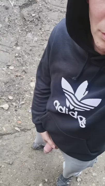 Tracksuit lad pissing
